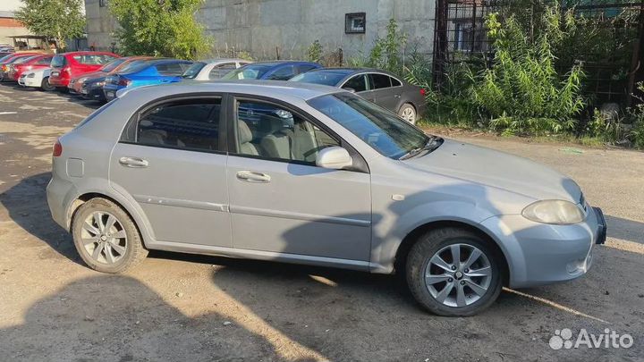 Моторчик заслонки отопителя Chevrolet Lacetti J200