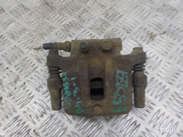 Суппорт тормозной задний левый Mitsubishi Lancer X