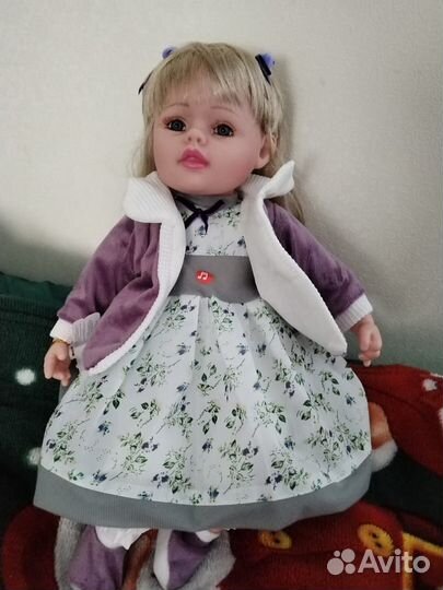 Кукла мягконабивная,говорящая