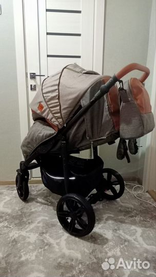 Прогулочная всесезонная коляска camarelo elix