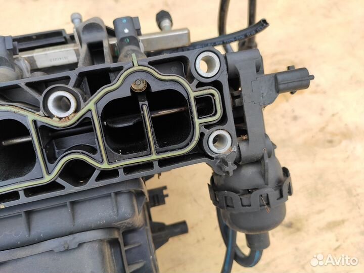 Впускной коллектор Z16XE1 на Opel Astra H Zafira B