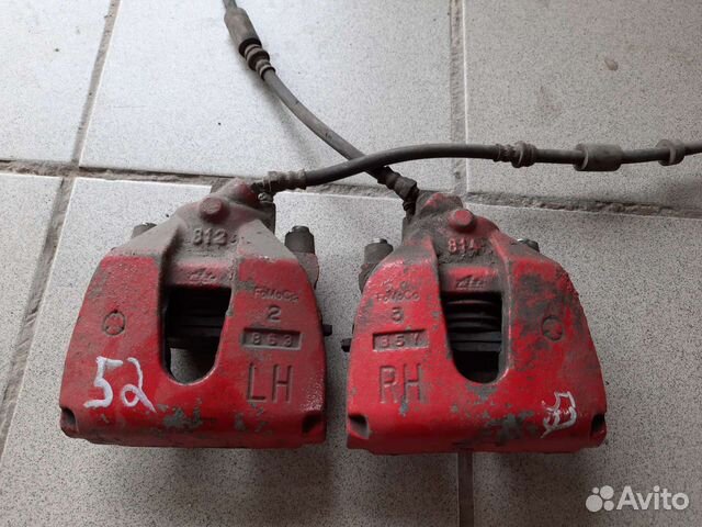 Суппорт тормозной передний mazda 3 bk