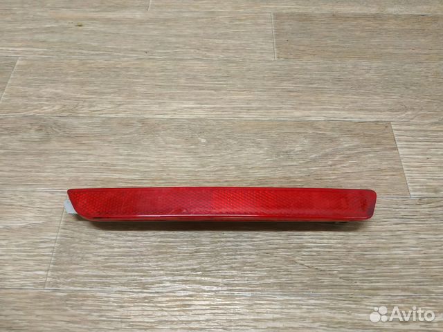 Отражатель в бампер задний левый Mazda 3 BK