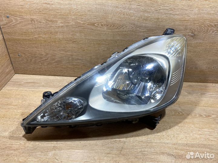 Фара передняя левая Honda Fit 2 141072