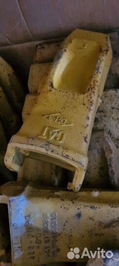 Коронки на ковш caterpillar