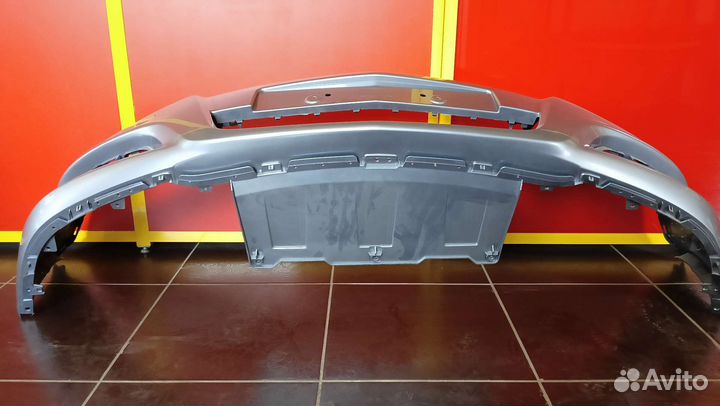 Передний бампер Opel Astra H