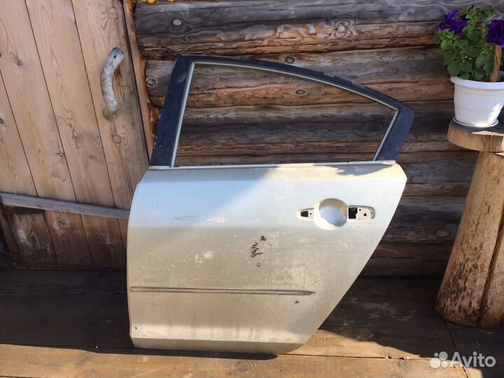 Дверь мазда 3