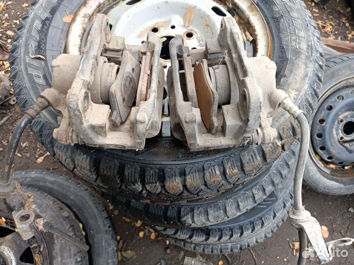 Рено Меган 2 суппорт тормозной передний