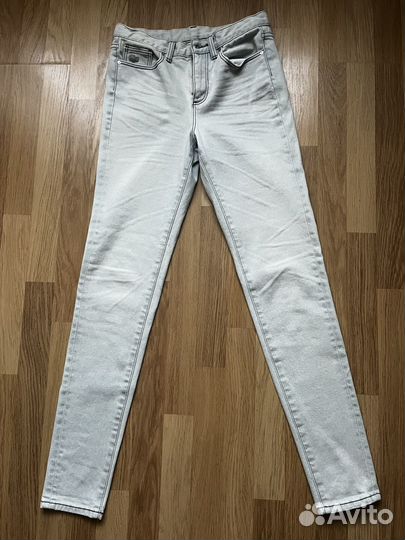 Джинсы Lacoste