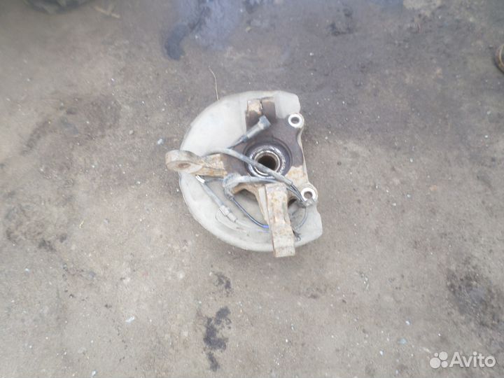 Поворотный кулак в сборе. Mitsubishi Lancer 10
