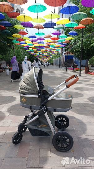 Каляска люксмом