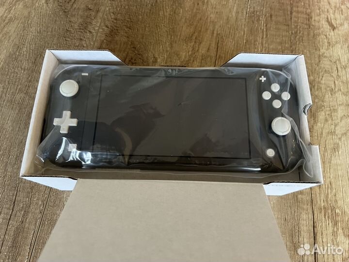 Игровая приставка Nintendo Switch Lite серый рст