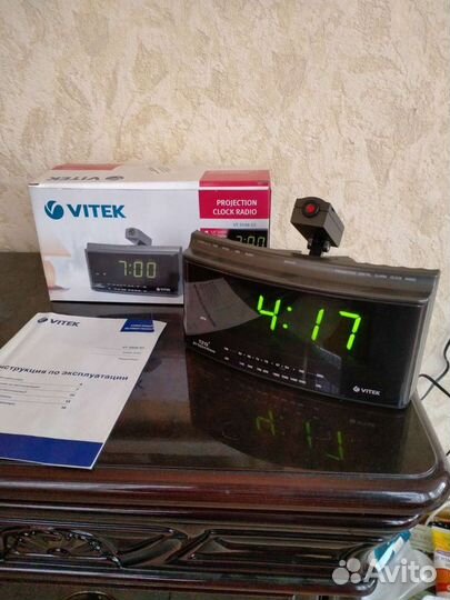 Электронные часы с радио и проэктором времени