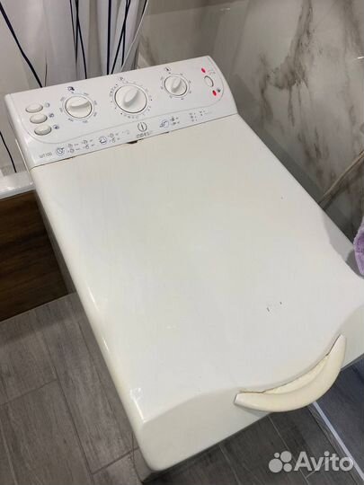 Стиральная машинка с вертикальной загрузкой