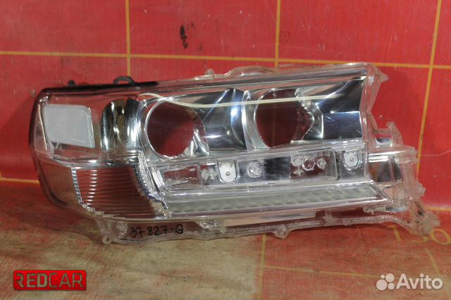 Стекло фары правой с дхо Toyota Land Cruiser 200