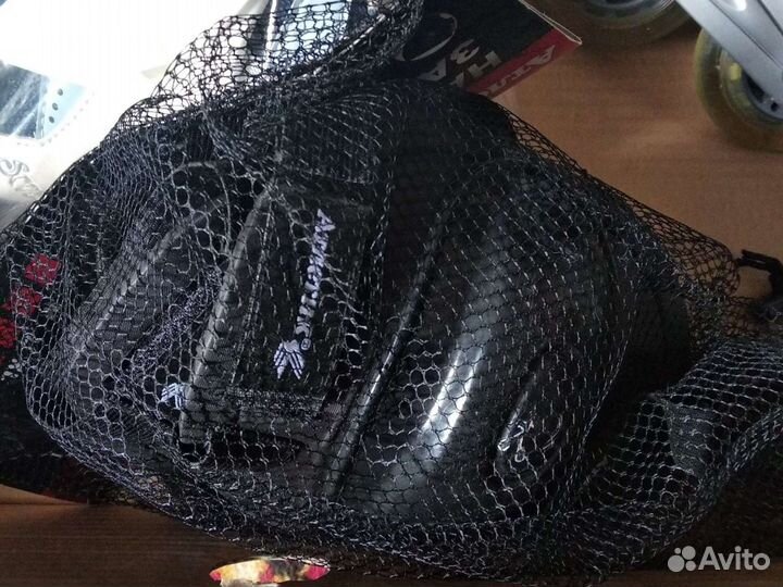 Роликовые коньки