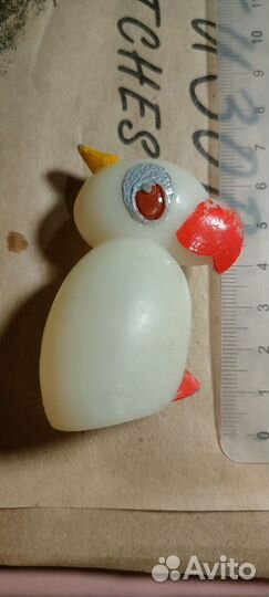 Игрушечный попугай