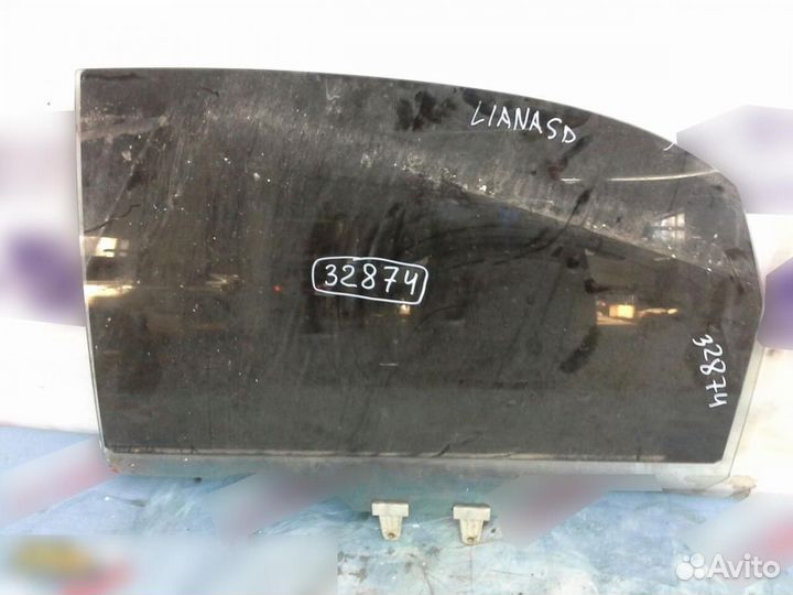 Стекло двери задней левой Suzuki Liana 2001-2007