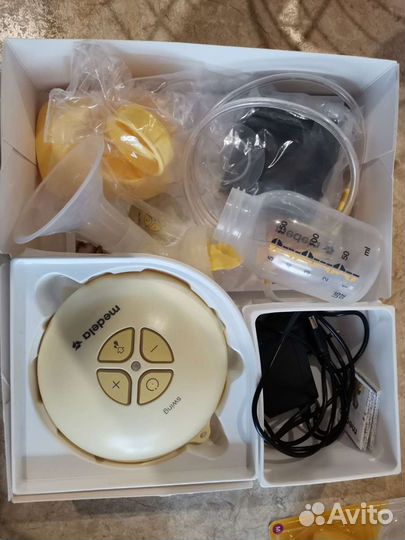 Молокоотсос medela swing электрический