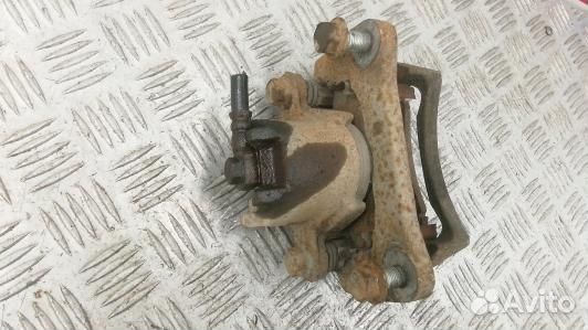 Суппорт тормозной задний левый mitsubishi pajero 4