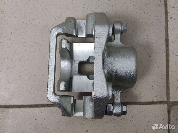 Суппорт задний левый Ssang Yong Kyron Rexton