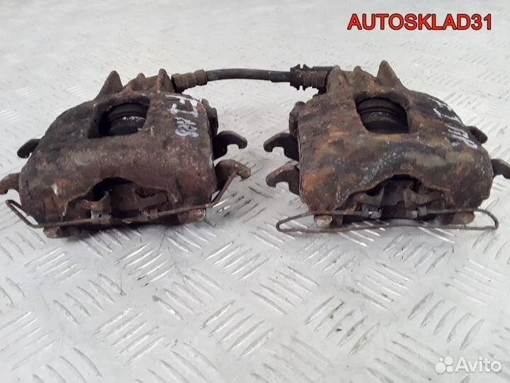 Суппорт тормозной передний Ford Focus 11478514
