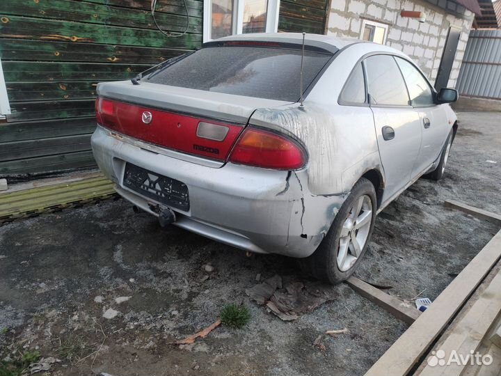 Mazda 323 1.8 МТ, 1997, 281 748 км