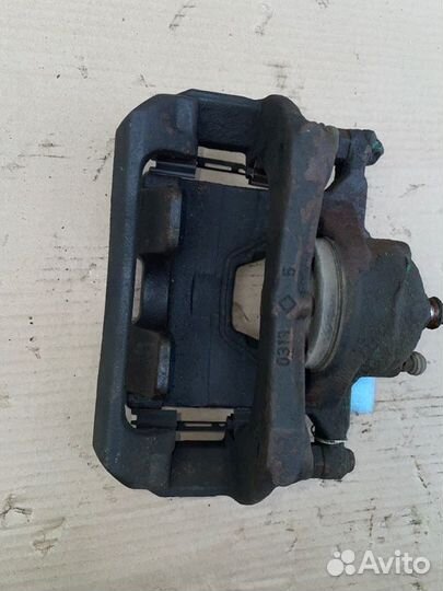 Суппорт тормозной передний левый Chevrolet Cruze