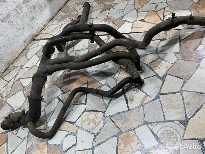 Патрубок системы охлаждения Renault Logan седан