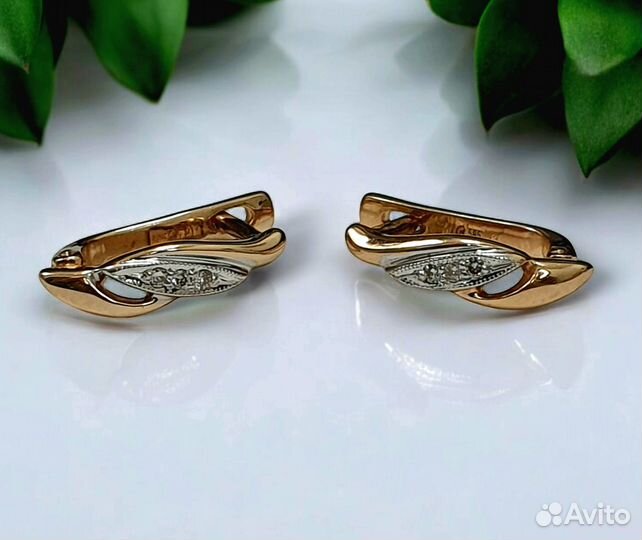 Золотые серьги с фианитами 585