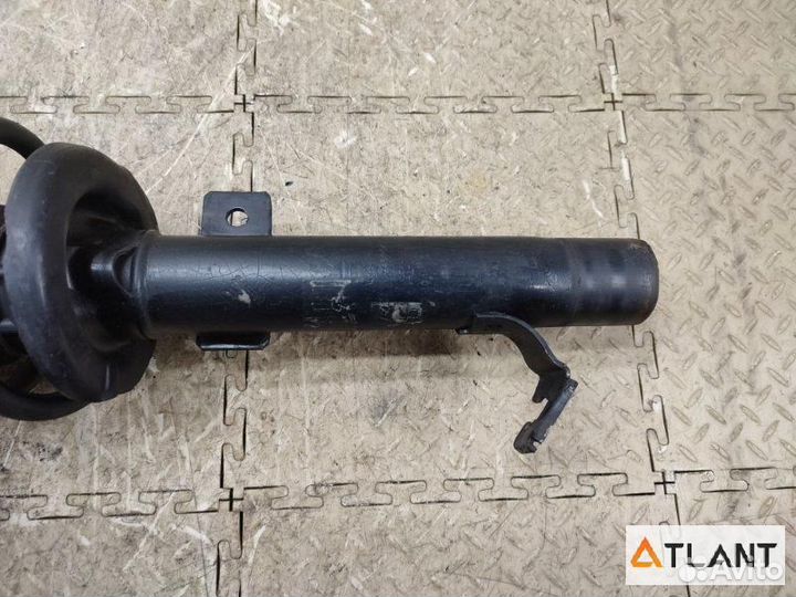 Стойка передняя левая mazda demio