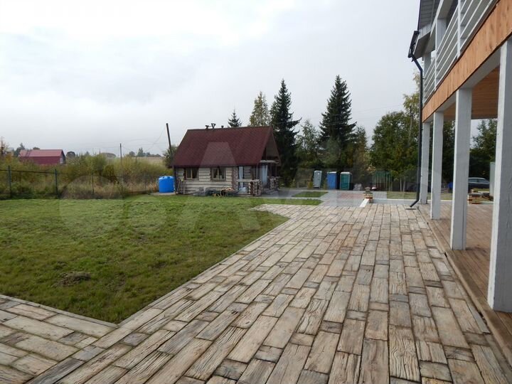 Коттедж 894 м² на участке 20 сот.