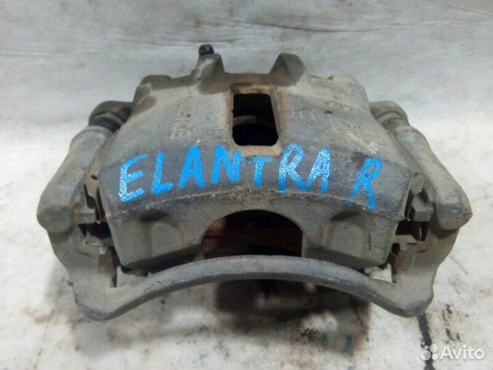 Суппорт передний передний правый Hyundai Elantra 3