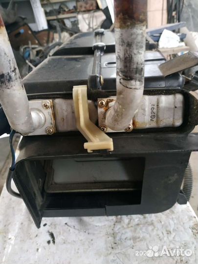 Радиатор печки саненг Муссо