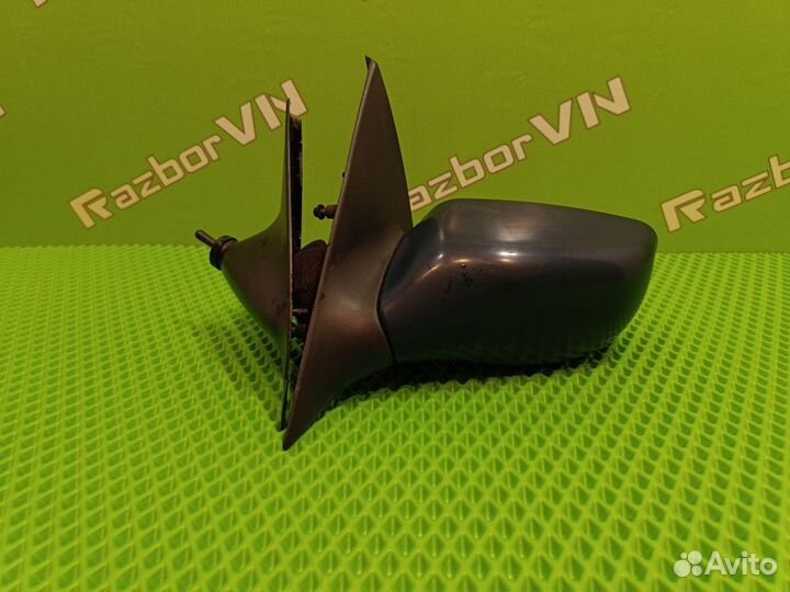 Зеркало левое Ford Escort 95-00