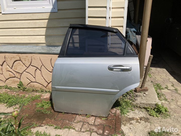 Дверь задняя левая Chevrolet Lacetti седан