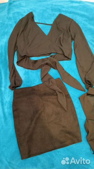 Пакет вещей черного цвета на девушку отправлено