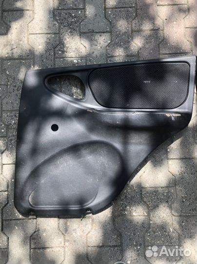 Обшивки шевроле нива задние