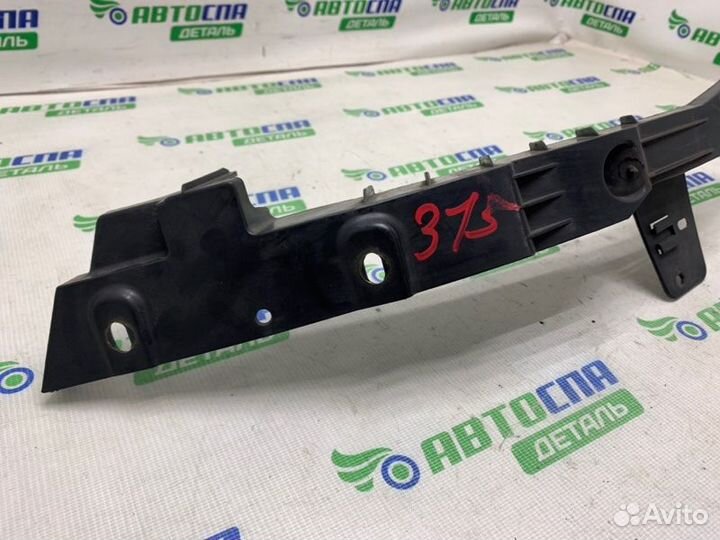 Кронштейн фары передний левый Opel Astra J хетчбек