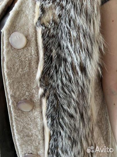Меховая жилетка