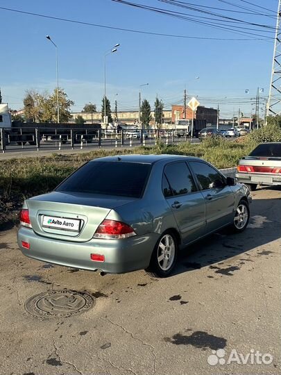 Mitsubishi Lancer 1.6 МТ, 2006, 99 999 км