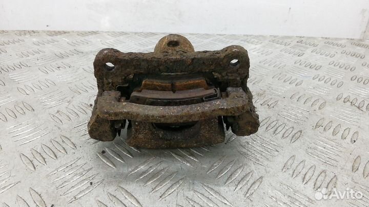 Суппорт задний левый Toyota Corolla