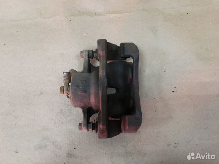 Суппорт тормозной передний правый Toyota Corolla