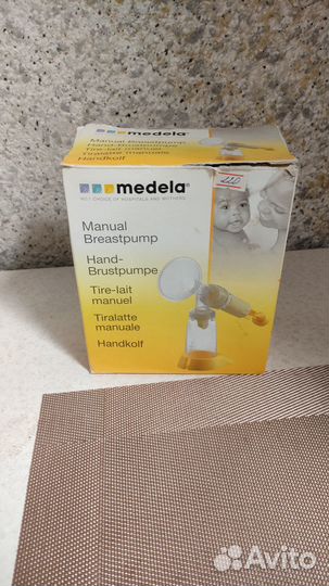 Молокоотсос ручной medela