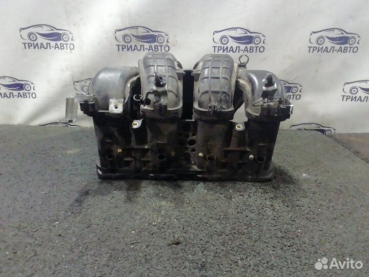 Коллектор впускной lancer