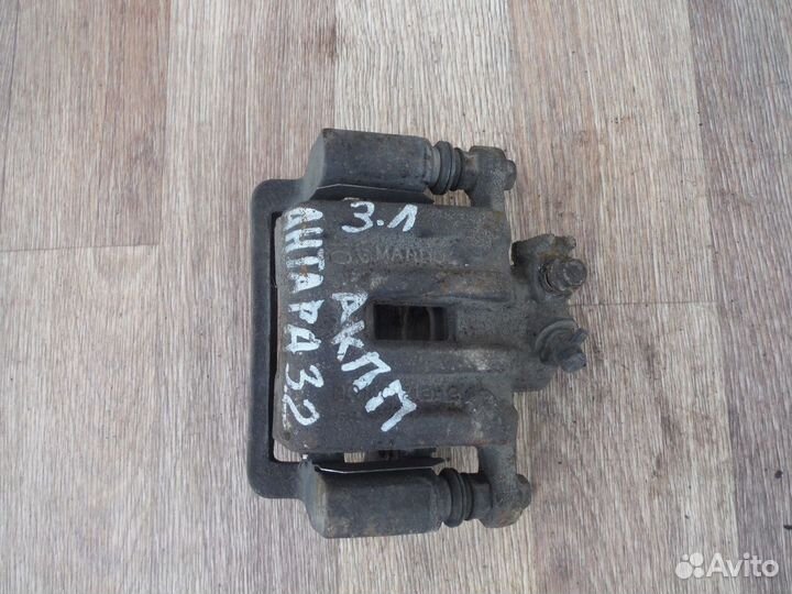 Суппорт тормозной задний левый opel Antara 2009