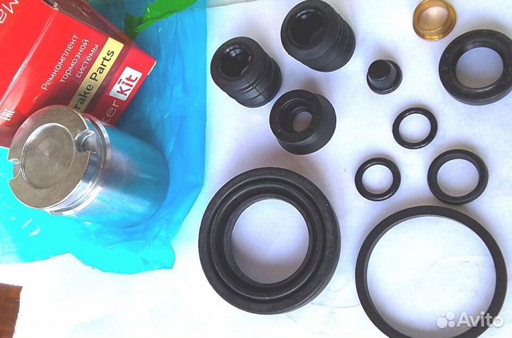 Ремкомплект заднего суппорта Ауди 100 80 с поршнем