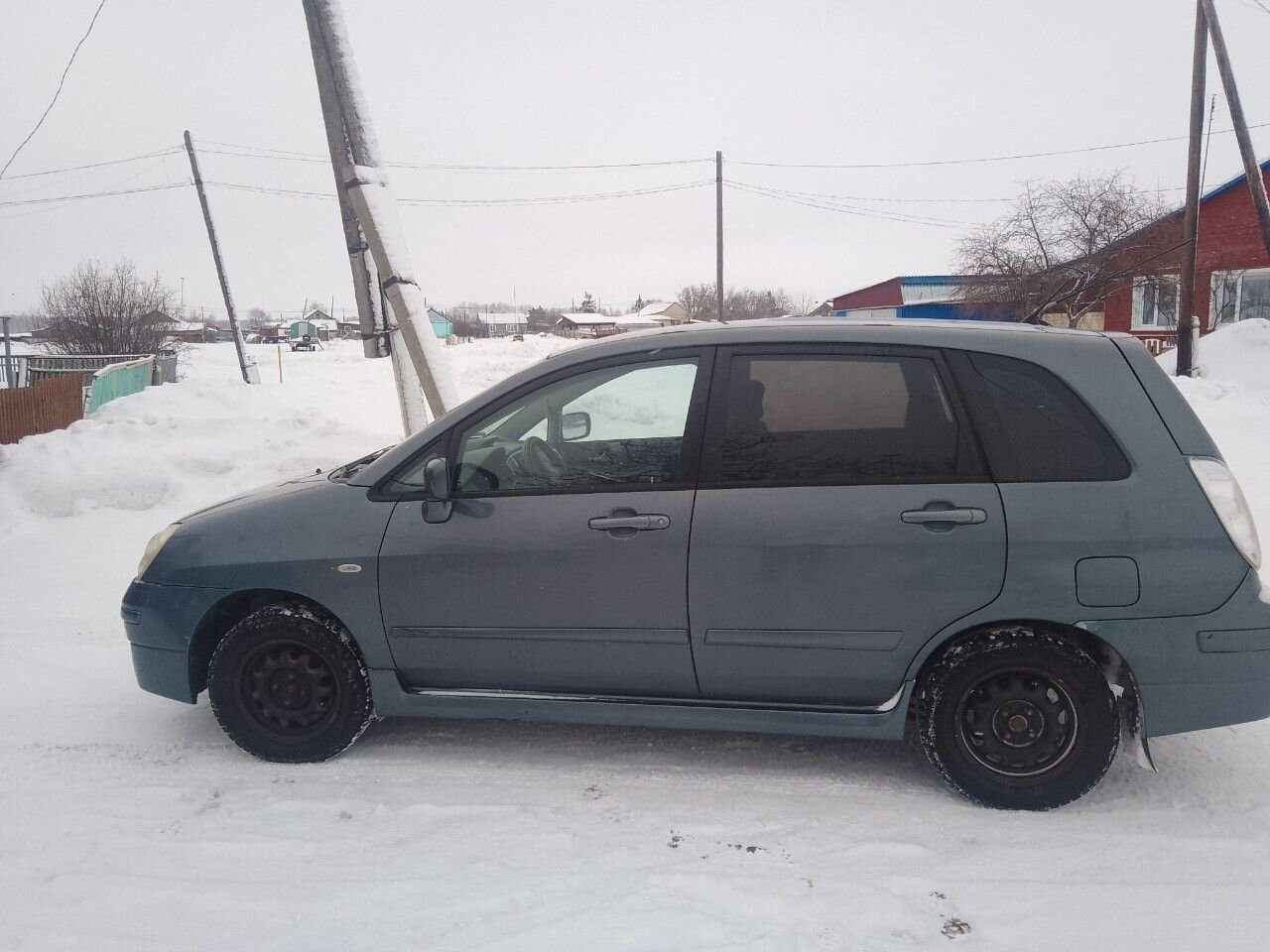 Suzuki Liana: фото владельца