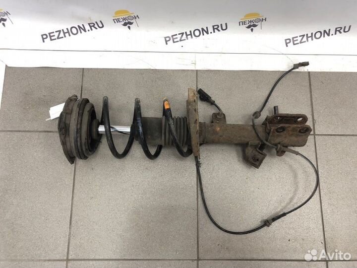 Амортизатор передний левый Nissan Note хэтчбек 5