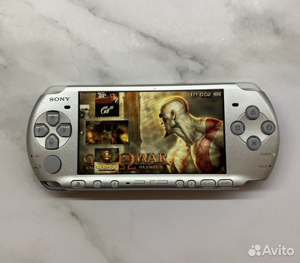 Sony PSP 3008 прошитая + 130 игр